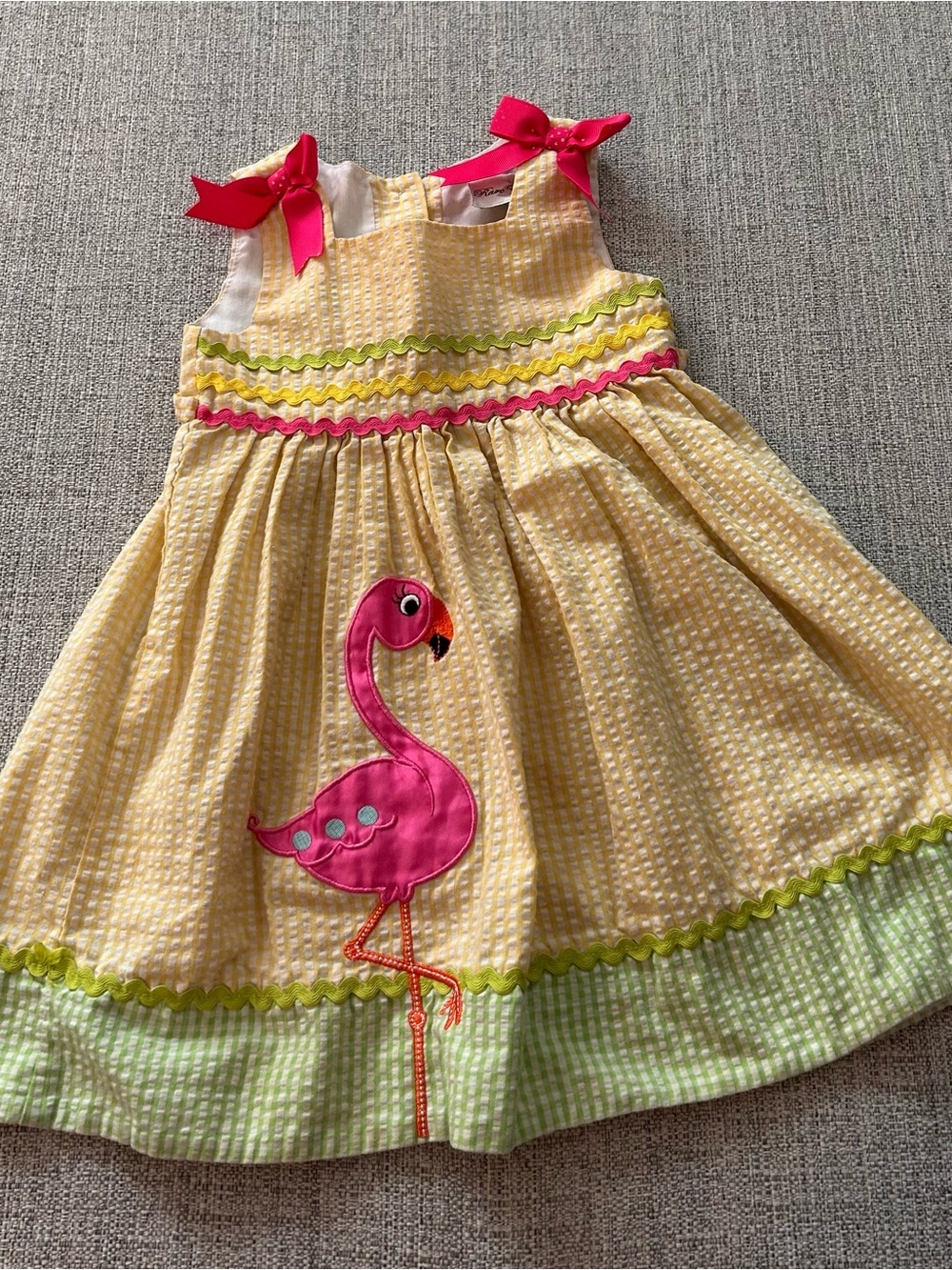 Rare Editions Yellow Seersucker Flamingo Sundress with Pink Bows.   Size 2T
